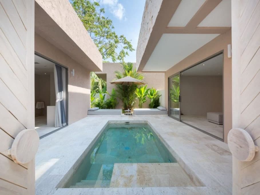 A private pool beside the bedroom of the duplex suite